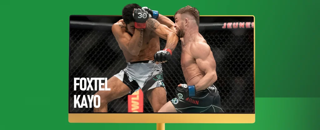 Two UFC fighters are engaged in a match on TV. The text reads ‘Foxtel Kayo’ on a green background.