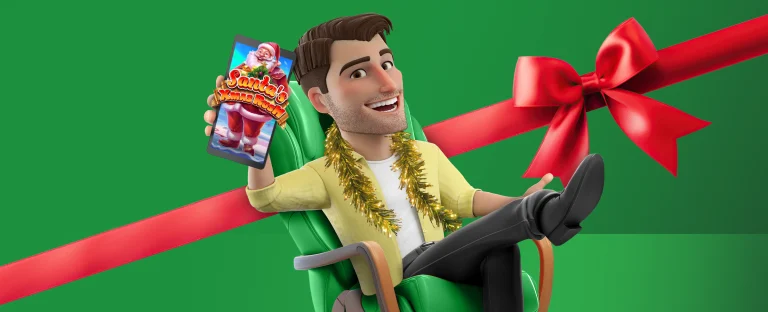 A 3D animated male character is sitting in a chair, holding up a smartphone which displays the Joe Fortune online pokie, Santa’s Xmas Rush. A Christmas present style red ribbon also features. On a green background.