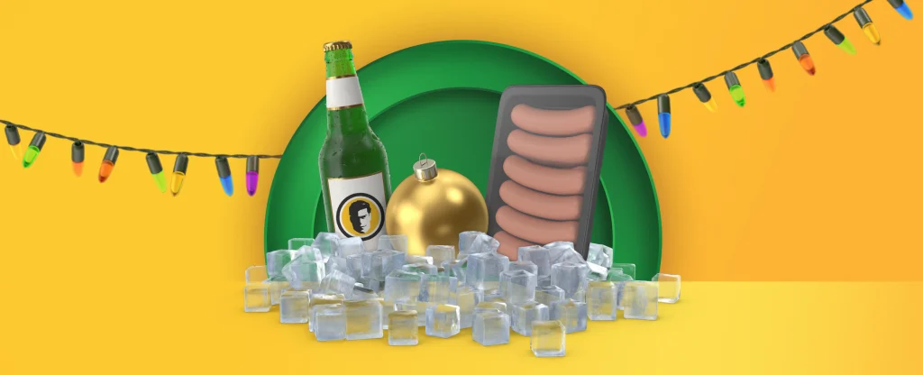 A bottle of beer, a packet of sausages and a cluster of ice feature alongside Christmas lights. On a two-tone yellow background.