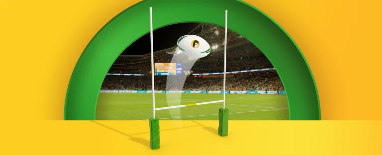 A rugby ball flies over a goal post. An NFL stadium full with a crowd also features. On a yellow background.